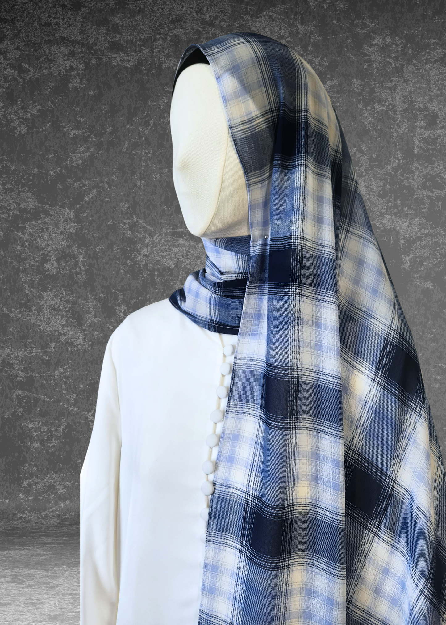 Elevate your style with the Highland Harmony Blue Plaid Hijab. Premium soft chiffon, 175cm x 70cm. Lightweight, breathable & perfect for elegant draping.
