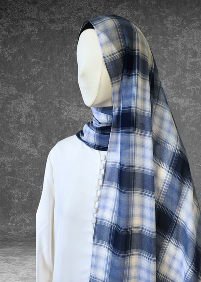 Elevate your style with the Highland Harmony Blue Plaid Hijab. Premium soft chiffon, 175cm x 70cm. Lightweight, breathable & perfect for elegant draping.