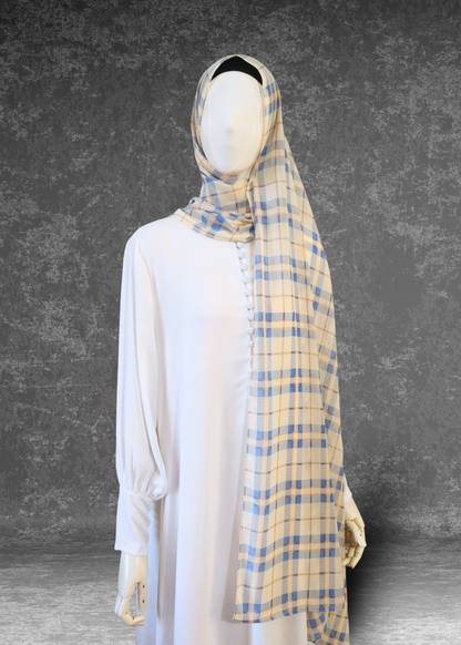 Lighten your look with the Coastal Check Chiffon Hijab in cream and blue. Breathable, premium fabric designed for effortless draping. Shop Khushu now.