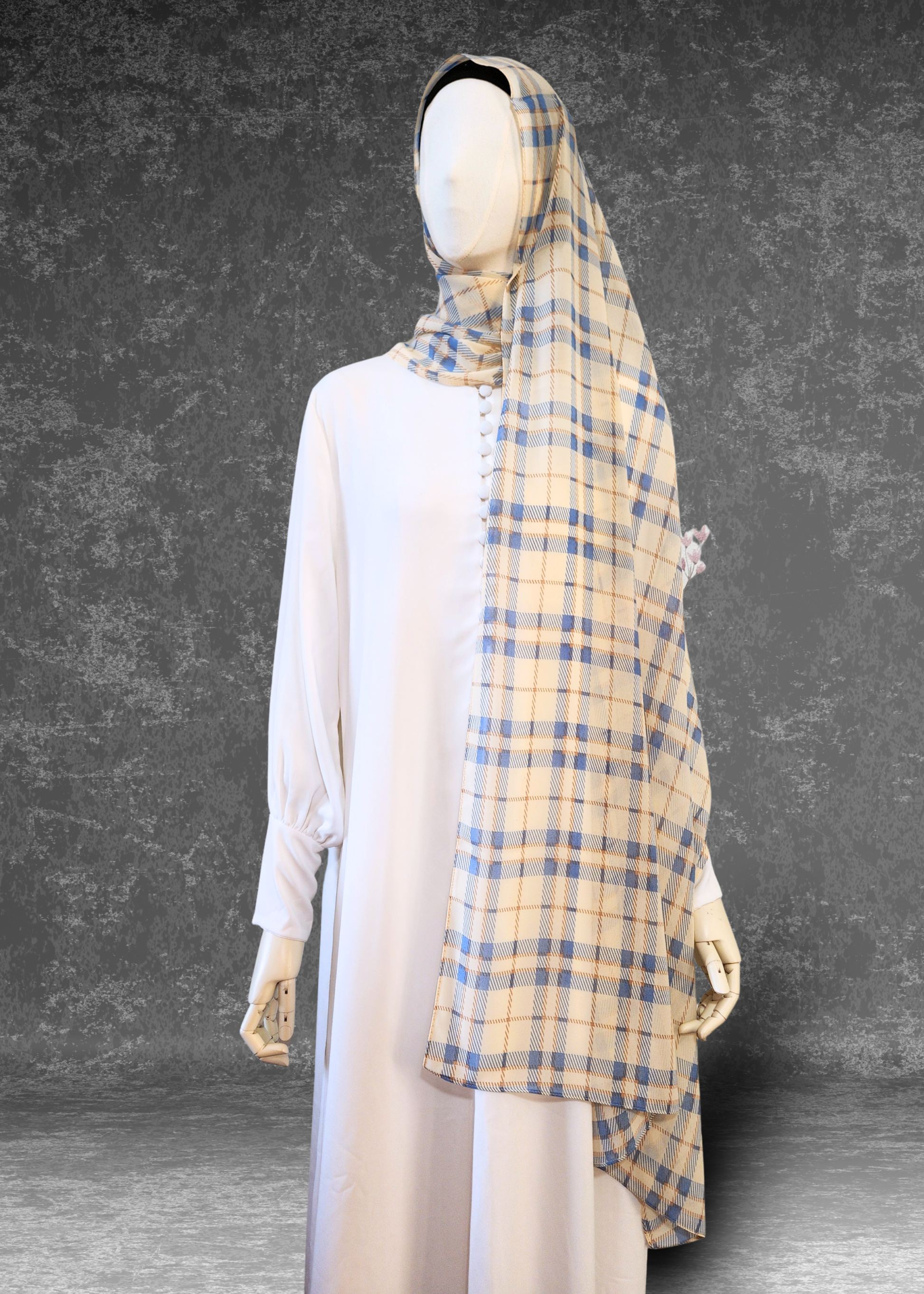Lighten your look with the Coastal Check Chiffon Hijab in cream and blue. Breathable, premium fabric designed for effortless draping. Shop Khushu now.