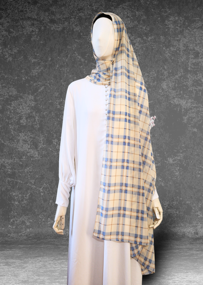 Lighten your look with the Coastal Check Chiffon Hijab in cream and blue. Breathable, premium fabric designed for effortless draping. Shop Khushu now.