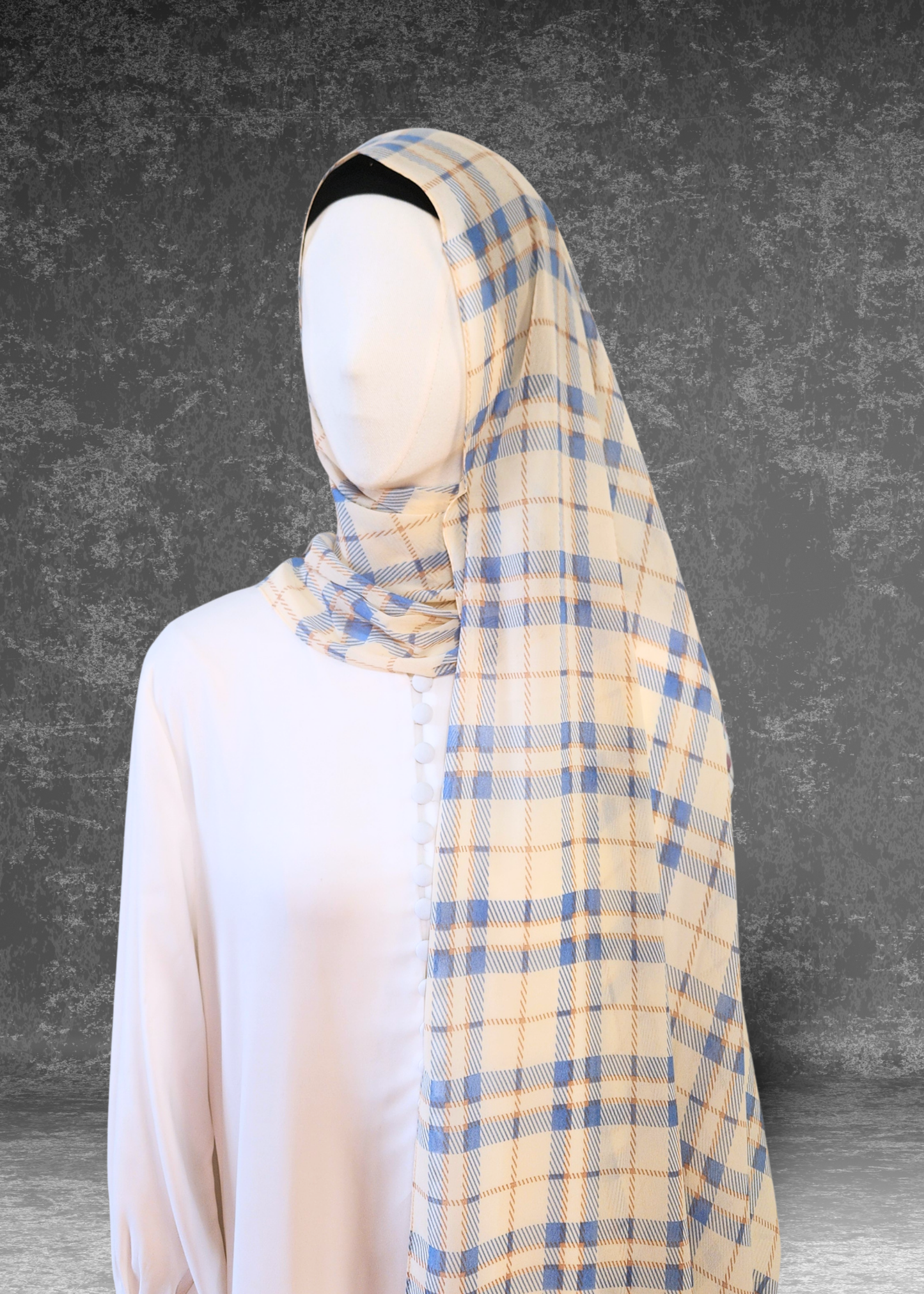 Lighten your look with the Coastal Check Chiffon Hijab in cream and blue. Breathable, premium fabric designed for effortless draping. Shop Khushu now.