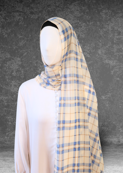 Lighten your look with the Coastal Check Chiffon Hijab in cream and blue. Breathable, premium fabric designed for effortless draping. Shop Khushu now.